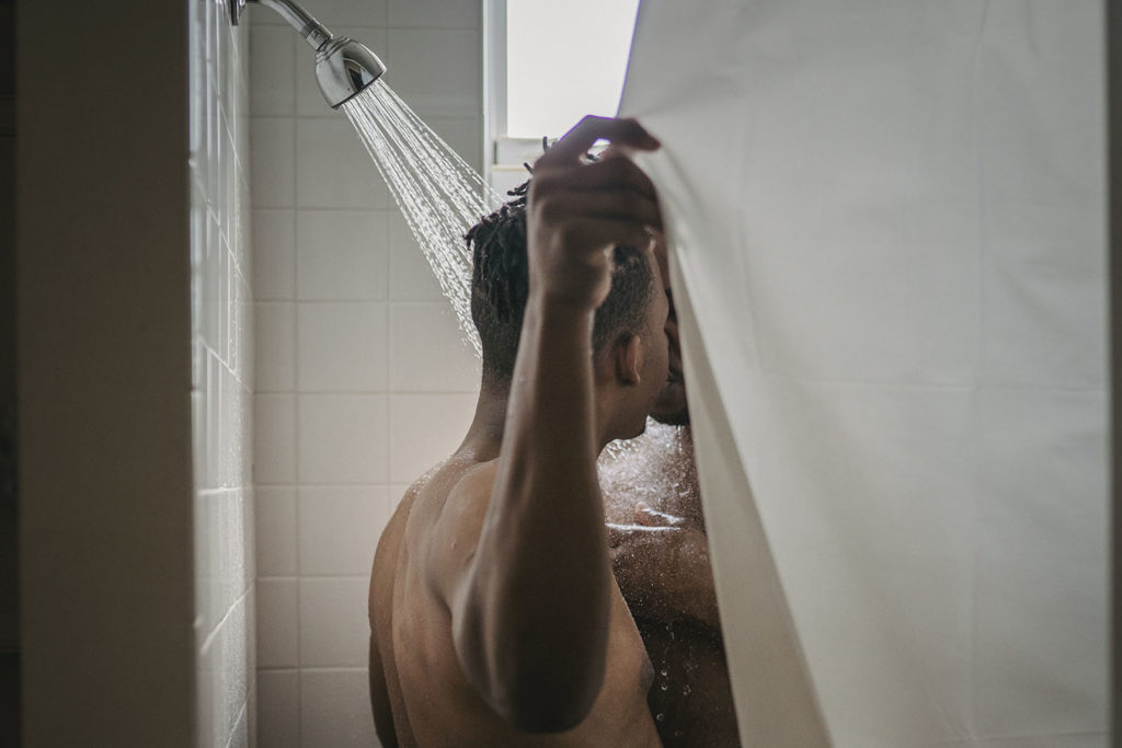 Men having sex in the shower